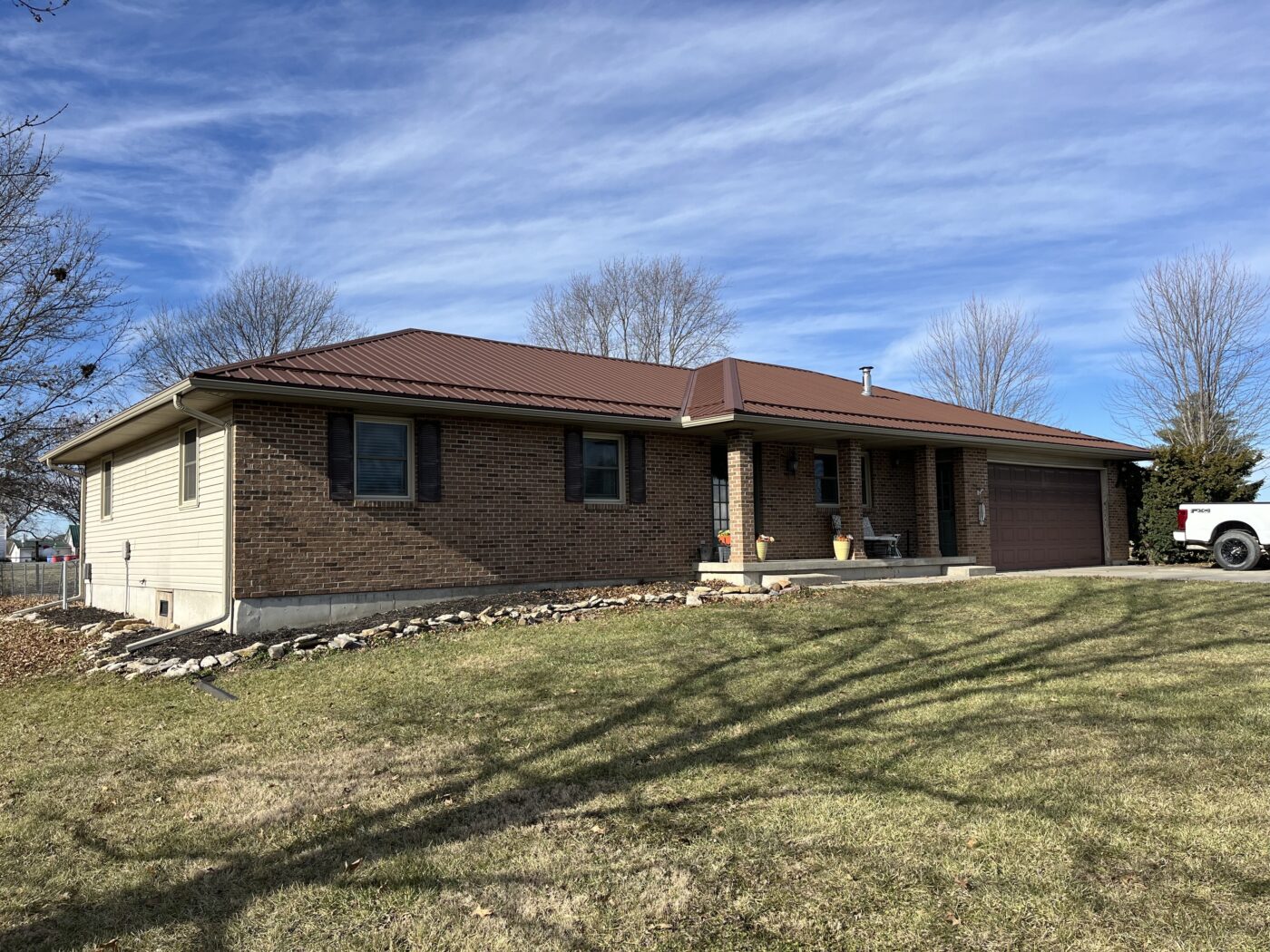 5 inch gutter with 3x4 downspout and sureflow leaf guard, it is located in Braymer Mo