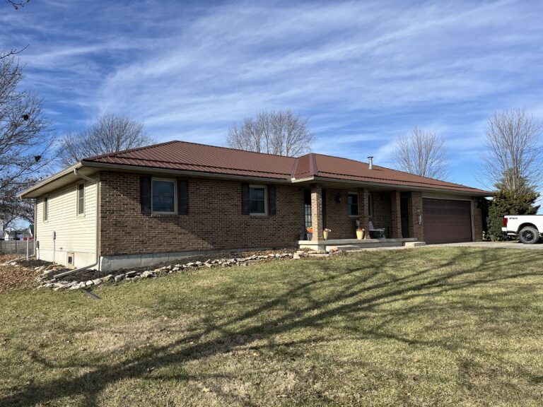 5 inch gutter with 3x4 downspout and sureflow leaf guard, it is located in Braymer Mo